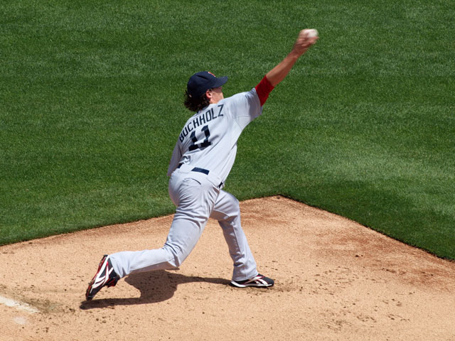 Clay Buchholz throwing a pitch from a mound