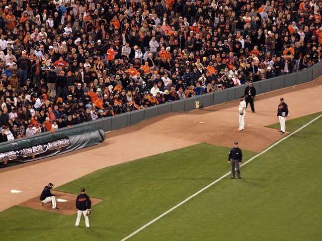 SF Giants Closer Brian Wilson warming up in the on-field bullpen with his bullpen coach